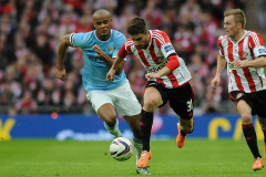 Fabio Borini of Sunderland battles with Vincent Kompany of Manchester City - Sunderland vs Manchester City - Capital One Cup Final Football at Wembley Stadium, London - 02/03/14 - MANDATORY CREDIT: Steven White/TGSPHOTO - Self billing applies where appropriate - 0845 094 6026 - contact@tgsphoto.co.uk - NO UNPAID USE Fabio Borini of Sunderland battles with Vincent Kompany of Manchester City - Sunderland vs Manchester City - Capital One Cup Final Football at Wembley Stadium, London - 02/03/14 - MANDATORY CREDIT: Steven White/TGSPHOTO - Self billing applies where appropriate - 0845 094 6026 - contact@tgsphoto.co.uk - NO UNPAID USE
