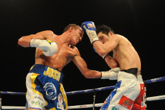 Josh Warrington (white, blue and yellow shorts) defeats Hisashi Amagasa (red, white and blue shorts) on points during a Boxing show at the First Direct Arena on 16th April 2016 Josh Warrington (white, blue and yellow shorts) defeats Hisashi Amagasa (red, white and blue shorts) on points during a Boxing show at the First Direct Arena on 16th April 2016
