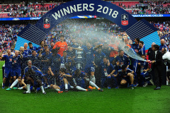 Chelsea manager Antonio Conte sprays champagne onto his players after winning the FA Cup during Chelsea vs Manchester United, Emirates FA Cup Final Football at Wembley Stadium on 19th May 2018 Chelsea manager Antonio Conte sprays champagne onto his players after winning the FA Cup during Chelsea vs Manchester United, Emirates FA Cup Final Football at Wembley Stadium on 19th May 2018