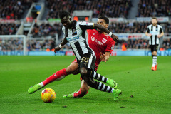 iChristian Atsu of Newcastle United battles with Zak Vyner of Bristol City during Newcastle United vs Bristol City, Sky Bet EFL Championship Football at St. James' Park on 25th February 2017 iChristian Atsu of Newcastle United battles with Zak Vyner of Bristol City during Newcastle United vs Bristol City, Sky Bet EFL Championship Football at St. James' Park on 25th February 2017