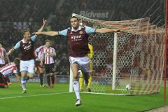 Andy Carroll of West Ham United celebrates scoring the opening goal of the game - Sunderland AFC vs West Ham United - Barclays Premier League Football at The Stadium of Light, Sunderland - 31/03/14 - MANDATORY CREDIT: Steven White/TGSPHOTO - Self billing applies where appropriate - 0845 094 6026 - contact@tgsphoto.co.uk - NO UNPAID USE Andy Carroll of West Ham United celebrates scoring the opening goal of the game - Sunderland AFC vs West Ham United - Barclays Premier League Football at The Stadium of Light, Sunderland - 31/03/14 - MANDATORY CREDIT: Steven White/TGSPHOTO - Self billing applies where appropriate - 0845 094 6026 - contact@tgsphoto.co.uk - NO UNPAID USE